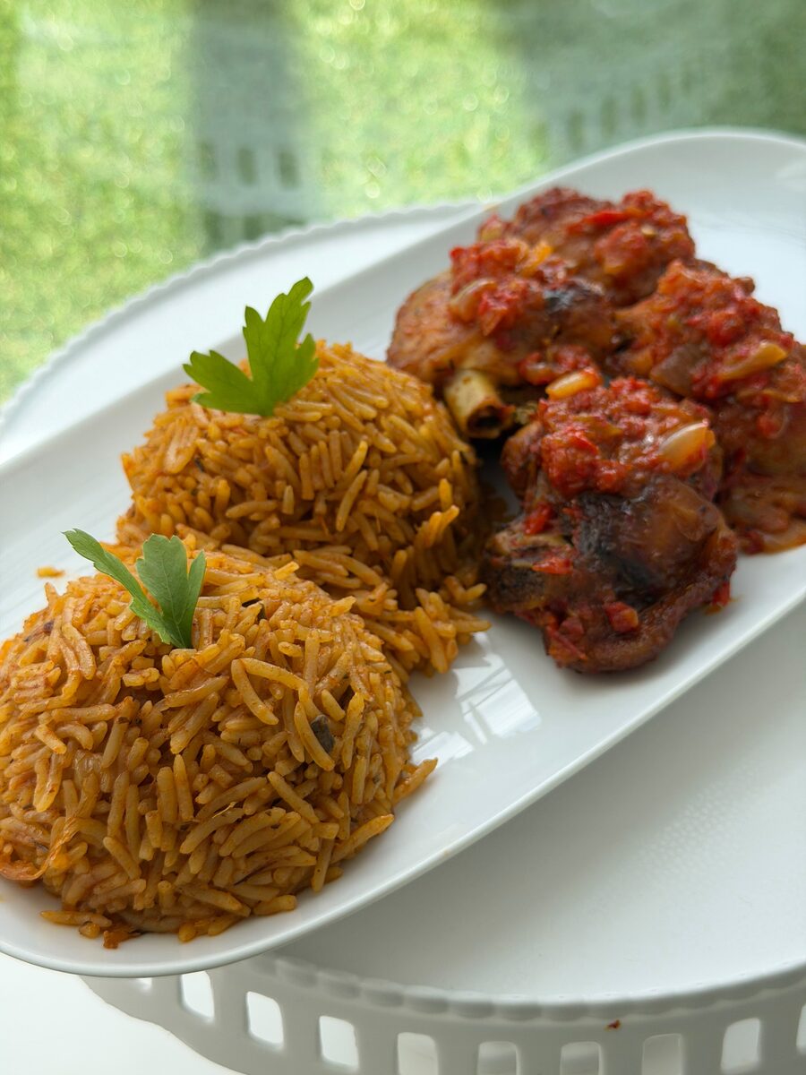 Authentic party jollof rice with peppered chicken